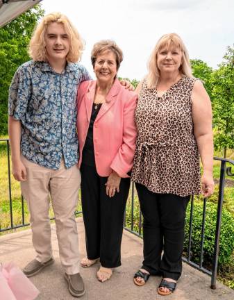 Photos: 80th birthday party Marjorie Strohsahl, center, with her grandson Henry Carle and daughter Gabrielle Lanelinais.