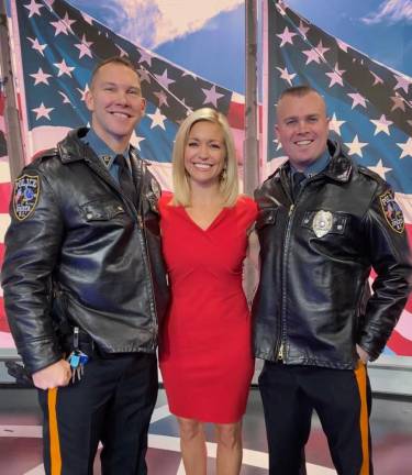 Fox News Channel's Fox and Friends morning host Ainsley Earhardt stands with Sparta Patrolmen Tom Herd and Brian Porter as Fox and Friends celebrates Law Enforcement Appreciation Day, on Jan. 10, 2020.