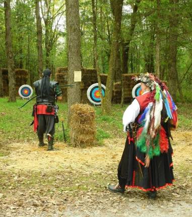 Pirates attending the Sparta Renaissance Festival try their hand at archery on Saturday, September 15, 2018. Photos by mandy Coriston