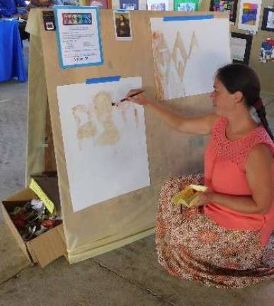 Sunny skies draw thousands to Fairgrounds for Sussex County Day Jennifer Ann Cooper-Cullinane paints the Mona Lisa in spicy mustard and barbecue sauce. The owner of JACCS Art Studio was promoting recycled art as part of Sussex County Day