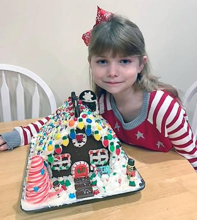 Gingerbread houses delight the judges Cliodhna Smith, first place kit, ages 6-8