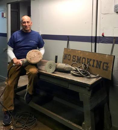 Steve Scro shows off a workbench and tools ,which belonged to his grandfather and uncle, Carmen Scro Sr. and Jr., at the Carl's Auto Body building in Lake Mohawk, which he now owns.