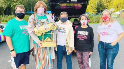 From left: Sean Dorsa (Edge Pride); Simone Kraus, holding the prize for the best-decorated car; lead organizer Cara Parmigiani of the TriVersity Center for Gender and Sexual Diversity, based in Milford, Pa.; and Fern Wolkin and Theresa Pil of Mother’s Demand Action (Photo provided by Simone Kraus)