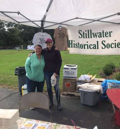Dianna Maggio, a resident of Stillwater (left) and Stacy Harvey (right) the Historical Society's Recording Secretary educate visitors about the Society and its importance.