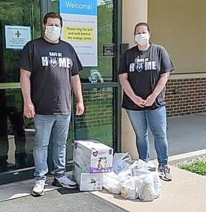 Sussex County Stars help the community through tough times Brother and sister team Karen and Rob Carney dropping off supplies at Project Self-Sufficiency, which assists low-income families (Photo provided)
