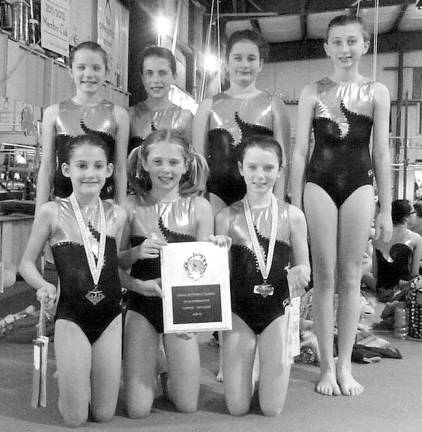 Giant gymnasts take first all around Garden Gator’s Copper team, with their first place plaque. Front row, Adelina Zahner and Marguertie Bysshe of Sparta, Amanda LiCausi of Milford, Pa. Back row: Torie Frisbie of Sandyston, Riley D’Allesandro of Sparta, Morgyn Witt of Newton and Maddie Doherty of Lafayette.