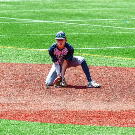 Photos: Pope John in baseball finals Will Ryan scoops up a ground ball at shortstop in the bottom of the first inning.