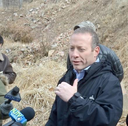 U.S. Rep. Josh Gottheimer at the dump site on Silver Spruce Drive in Vernon last February (Photo by Mike Zummo)