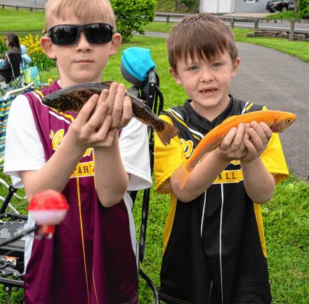 Photos: Annual Trout Derby in Sparta Bobby Nast and Jack O’Leary show off their catches.