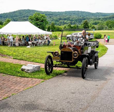 Photos: 80th birthday party Joe Warner offers Model T rides during the party.