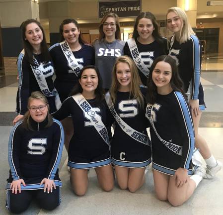 Sparta Cheerleaders who are in their final year of high school wear sashes noting they are 2020 Seniors: Evalyn Fitzsimmons, Cameron Leary, Camryn Gundry, Kate McGovern, Jess Berghofer, Bella Perry, Katie Carrigan.