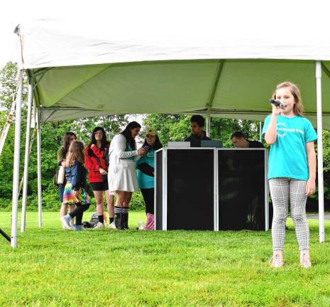 Township celebration marks 50th year Piper McCarrick, a student at Elisa Girlando Studios, performs at Sparta Day.