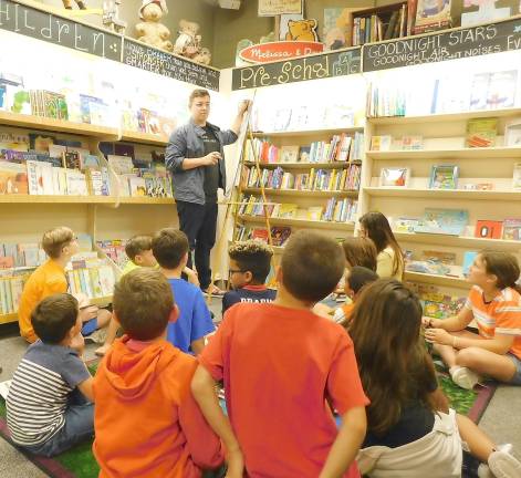 Best-selling author Max Brallier plays post-apocalyptic MadLibs with fans at Sparta Books on Tuesday, Sept. 17, 2019.