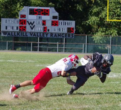 Lenape Valley smothers Wallkill in high school football Lenape Valley defensive back Connor Johnson takes down Wallkill Valley receiver Alfred Boye-codjoe. Boye-codjoe had a very productive day running 60 yards after catching the ball for a touchdown and another long gain on the ground for 83 yards resulting in a touchdown.
