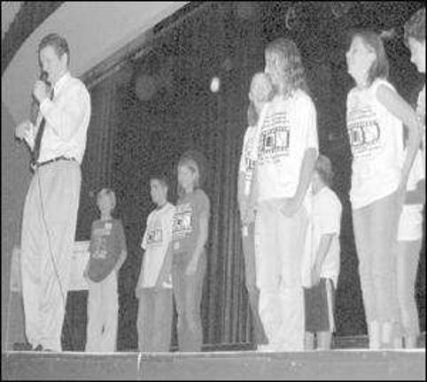 Students combat bullying at middle school summit Students combat bullying at middle school summit