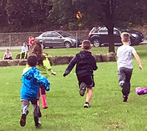 Photos by Laurie Gordon Kids part-take in children's races at the Stillwater Historical Society Fall Fest