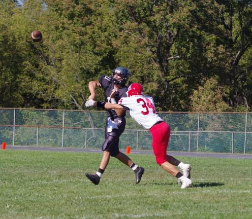 Lenape Valley smothers Wallkill in high school football Wallkill Valley quarterback Preston Nicolai throws the ball with a Lenape Valley defender in his face. Nicolai passed for 145 yards resulting in two touchdowns.