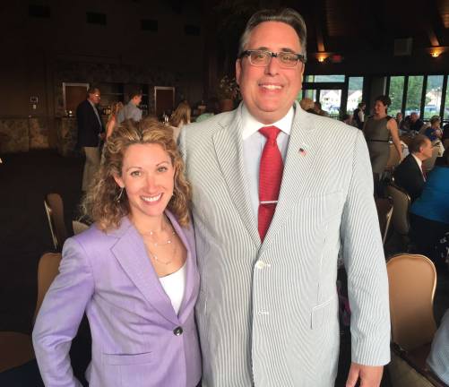 Sparta lawyer completes term as bar president Lauren Fraser with new incoming president John Williams.