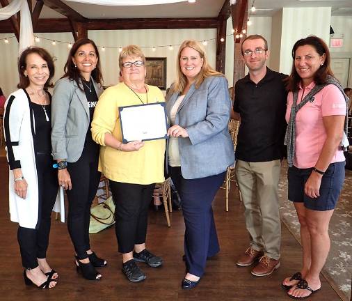 Director Michele Dreiblatt; United Way Chief Operating Officer Kiran Handa Gaudioso; United Methodist Communities at Bristol Glen Clinical Care Coordinator and Honey Open Committee Chair Dawn Hall; Gottheimer representative and Community Outreach Director for Warren and Sussex counties Cheryl Krouse; United Way of Northern New Jersey Community Impact Coordinator Sean Hyland; and United Way Director of Community Relations in Millburn-Short Hills Rose Twombly.