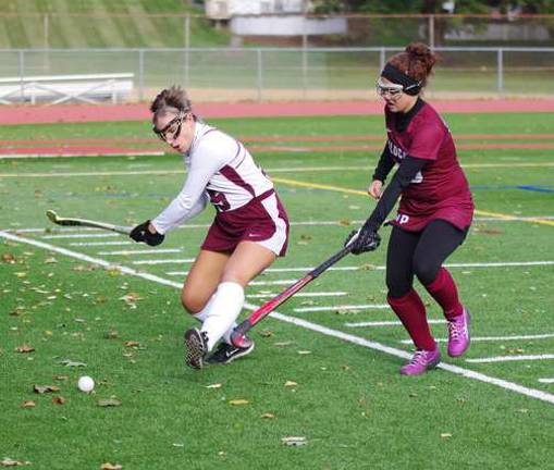 Newton bests Whippany Park in field hockey Newton's Katy Van Orden in mid swing while covered by Whippany Park's Carly Yannotta.