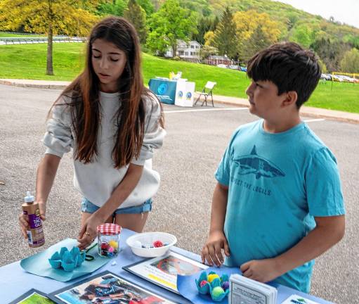 Photos: Earth Day Fair Jacob and Mia Amiel work on crafts.