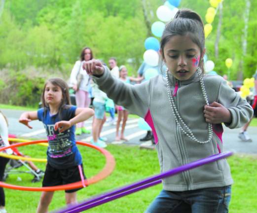 Bounce houses, face painting and more at Sparta Day Brooke Joy, 7, of Sparta.