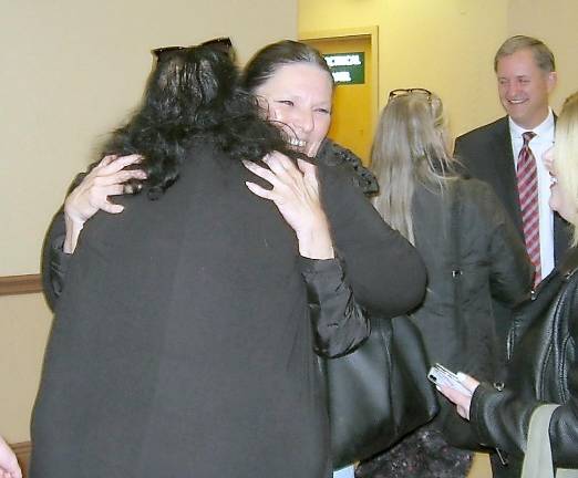 An ecstatic Danielle Varon celebrates her not guilty verdict with animal supporters.