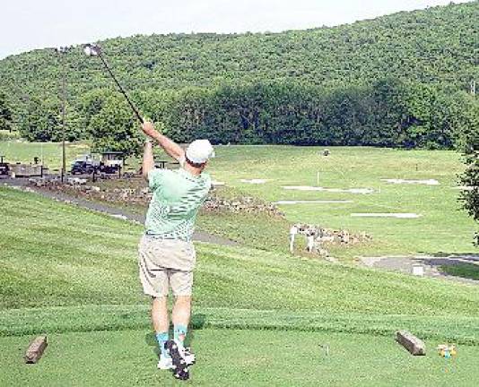 Brett Haughs attempted to qualify in the Men’s 18-49 Division with a 287 yard tee shot (Dr. John T. Whiting)