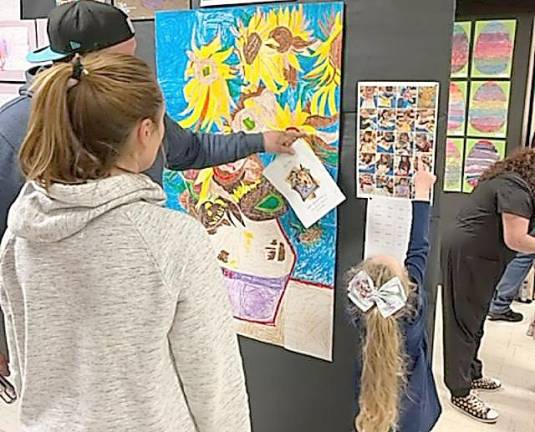 Family and students turn out for the school’s 4rth Annual Art Gala.