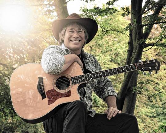 Sounds of yesteryear: Ragtime, blues harp <b>Ted Vigil portrays the legendary singer-songwriter in ‘</b>A John Denver Christmas’ on Saturday night at the Newton Theatre. (Photo courtesy of Ted Vigil)