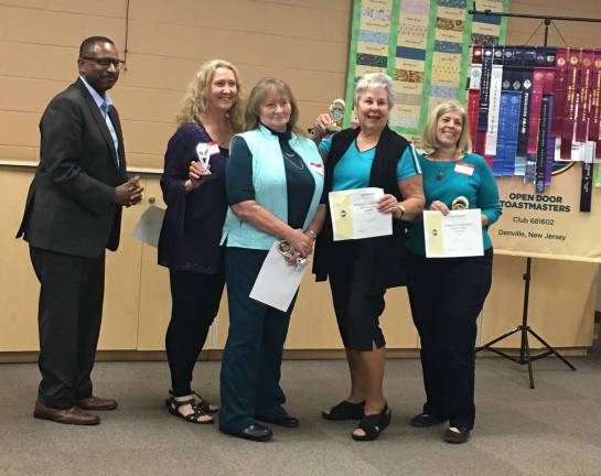 Speech contest winners advance From left, Division Director Tony Snow, Table Topics 1st Place Winner Debra M. Hollinrake, Table Topics 2nd Place Winner Joyce Dargel, Humorous Speech 1st Place Winner Dori Zarr, Humorous Speech 2nd Place Winner Ellen Oxild