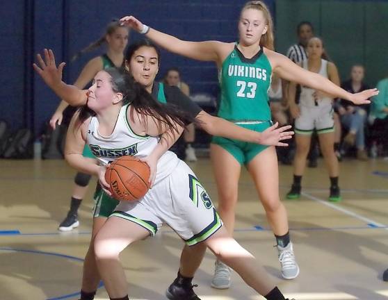 Sussex County's Madison Mailloux moves forward with the ball in the fourth quarter.