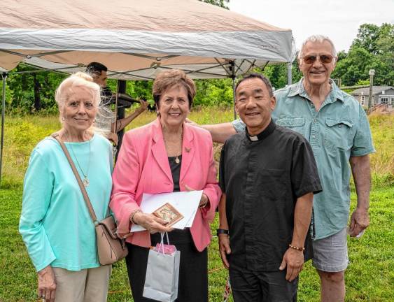 Photos: 80th birthday party From left, Kathleen Fitzsimmons, Marjorie Strohsahl, Father Mike Lee and Charles Garzik.