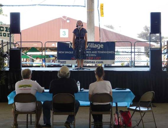 Sunny skies draw thousands to Fairgrounds for Sussex County Day Bridget Guziewicz, a senior at Newton High School, performs during the Sussex County Idol talent competition