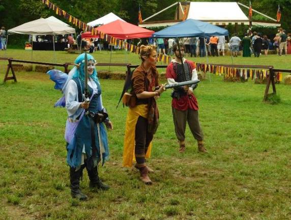 The Sparta Renaissance Festival offered squire training for young children. The instructors included the Blue Faery, an elf, and a royal squire.