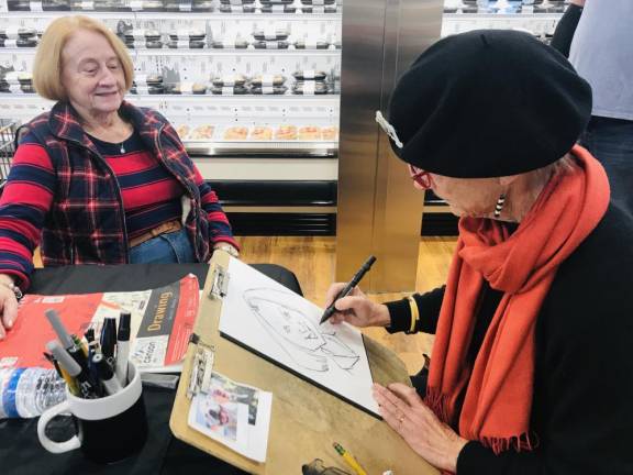 Mrs. Walton can hardly wait to show her granddaughter that she had a caricature drawing done in the middle of the produce aisle at ShopRite.