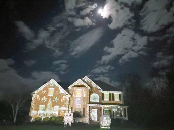 Through high tech projection art, a changing compilation of videos, pictures and gifs tell a story on the Galluccio family’s house. (Photo provided by Elaine Galluccio)