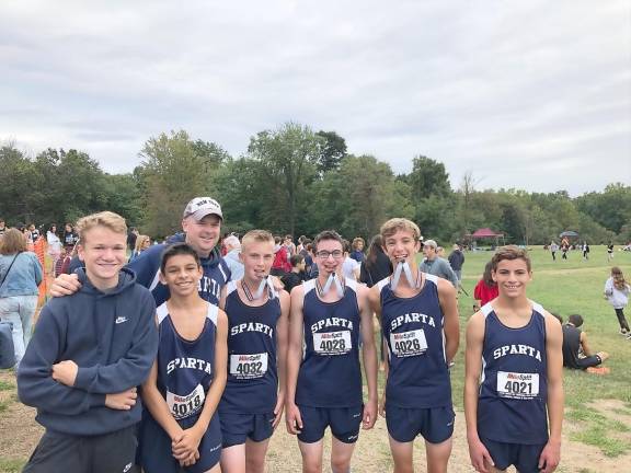 Cross country: the unseen sport Sparta's Owen Hassloch, Dillon Caswell, Charlie Sandgran, Dan Maher, Anthony Lane & James DiPasquale after a race with Coach Gilmartin. Charlie, Dan & Anthony earned medals by finishing in the top 12 of the Freshmen Boys Race at Garret Mountain on Sept. 14, 2019.