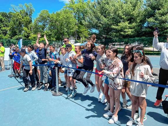 Green Hills, Ogdensburg teams among winners <b>Students cheer on their solar-powered cars in the Junior Solar Sprints on May 20 at Hershfield Park in Pompton Lakes. (Photo courtesy of Avenues in Motion)</b>