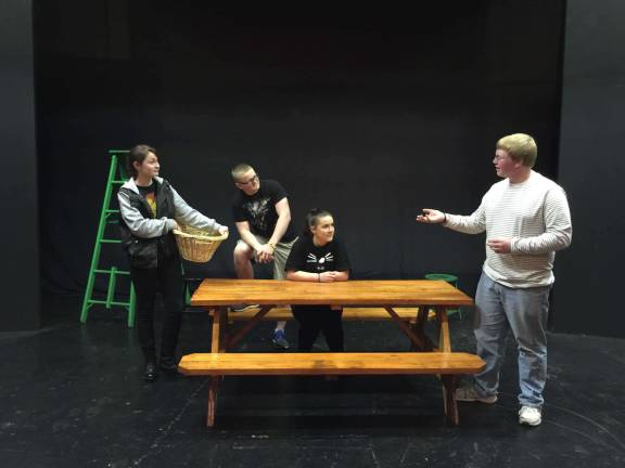Canterbury Tales come to life on stage Stage Manager, Matthew Fralley (standing) assists (from left to right) Emma Birmingham, Jerome Beyer and Kerry Opperman in rehearsal.