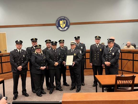 SM2 Members of the Sparta Fire Department receive a proclamation from the Township Council on Oct. 24 in honor of the department’s 100th anniversary. (Photos by Dave Smith)