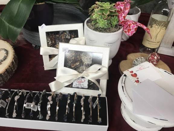 Bracelets, frames, plants, display at Redshaws.