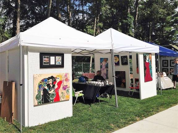 Artist Nina Palumbo at the Festival of Art and Wine Tasting Event held at LM Pool