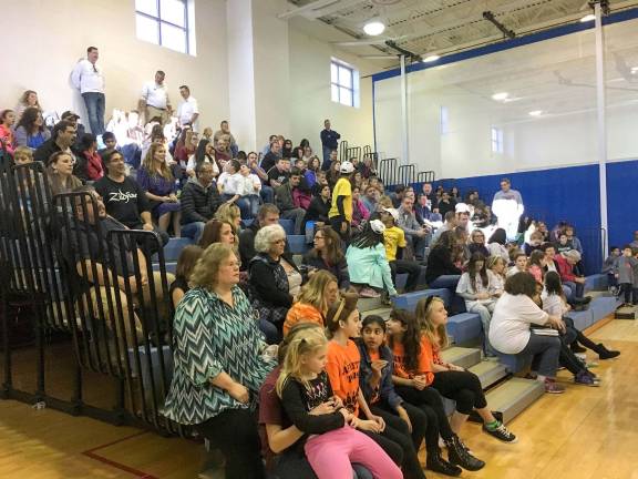 The spectators following the action