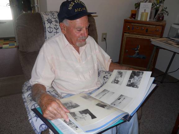 Sparta Navy veteran had front row seats to history Photo by Alexis Tarrazi Art Williams, 87 of Sparta looks over his scrapbook containing photos when he served in the Navy aboard the USS Teton during World War II.