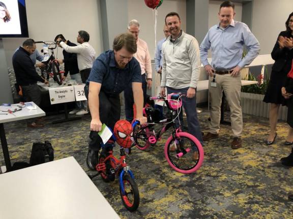 A Selective Insurance employee takes a bike for a test ride.