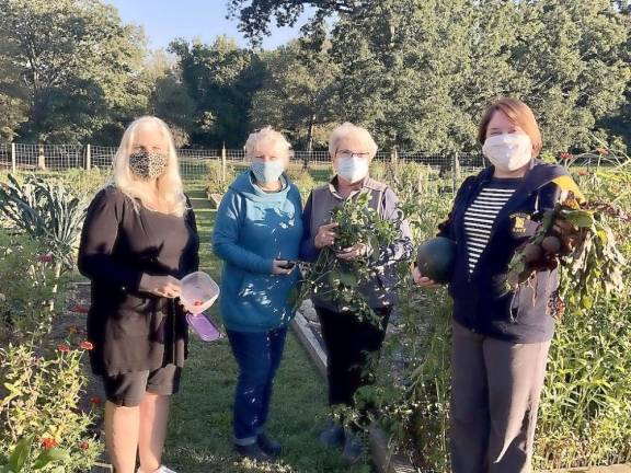 From left: food pantry coordinator Sharon Duschl Leon with gardeners Denise Koellhoffer, Ginny Lepore and Katie Baron (Photo provided)