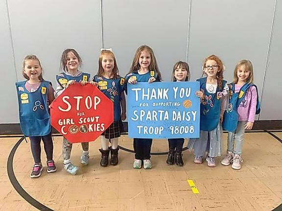 Local troop sells cookies, collects donations for local responders (L-R): Nicole Morris, Elizabeth Murphy, Kaelyn Daggett, Kaitlinh Monesmith, Quinn Kirschner, Aria Tinnirello and Madeline Coolbaugh. Not pictured: Lily Dockery