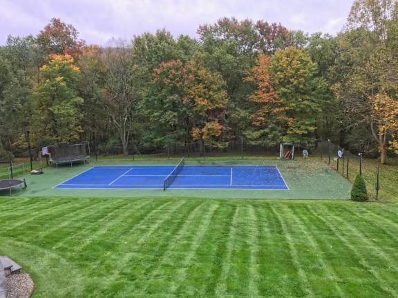 Gorgeous custom home with pool and tennis court