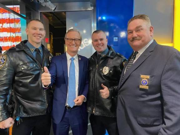 Sparta Police featured on Law Enforcement Appreciation Day Patrolmen Herd and Porter with Fox and Friends host Steve Doocy, ahead of their Law Enforcement Appreciation Day segment on the Fox News Channel. (Photo Provided by Brian Porter)